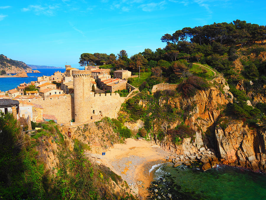 The ancient castle and the coast in Tossa de Mar, Spain Photograph by ...