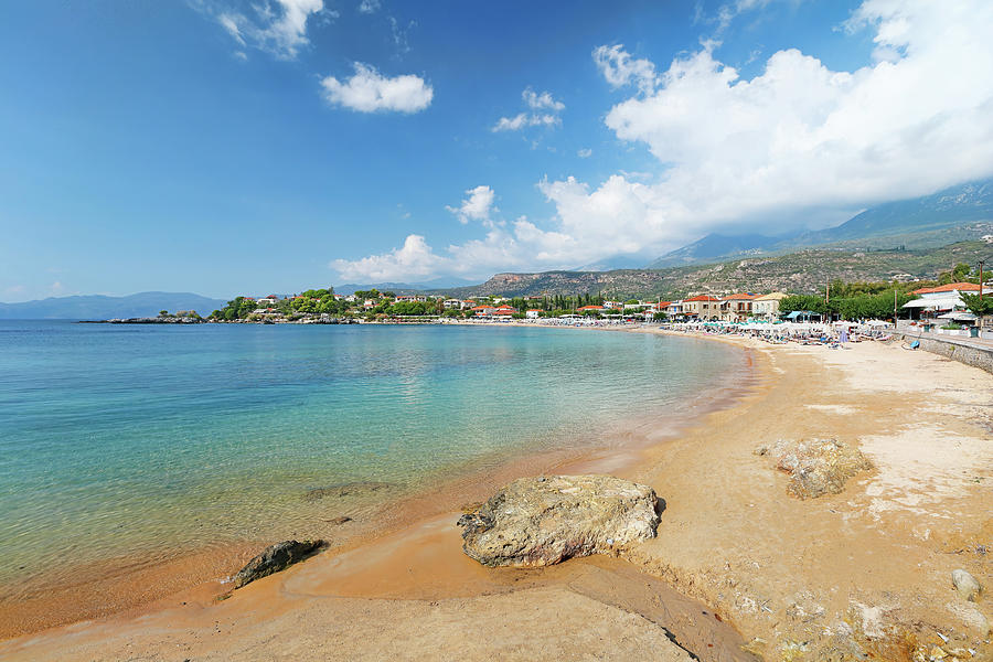 The beach and the village Stoupa in Mani, Greece Photograph by Constantinos Iliopoulos