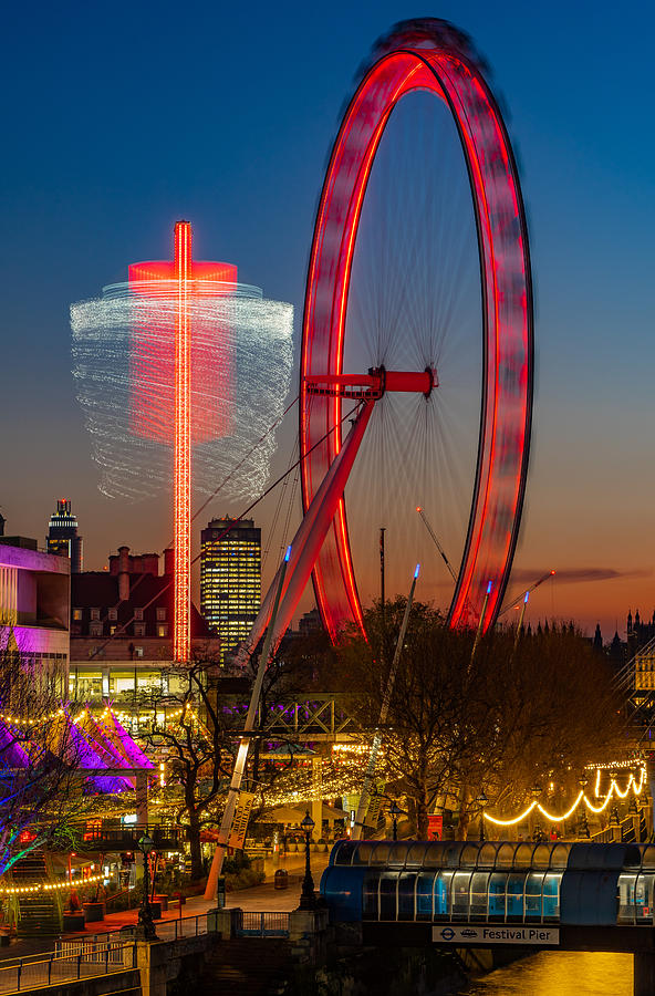 The beautiful London eye seen at blue hour. Photograph by George Afostovremea