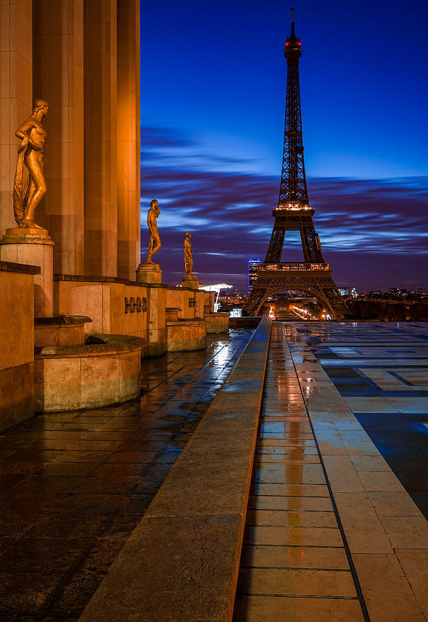 The beautiful statues of Paris and Eiffel Tower in France, seen from Trocadero on a lonely night. Photograph by George Afostovremea
