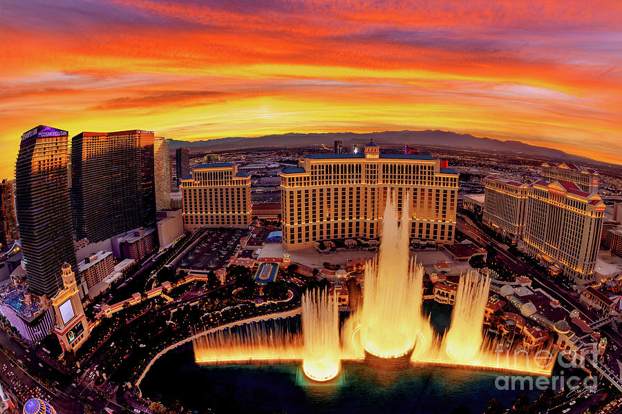 The Bellagio Fountains Bright Warm Cloudy Sunset Photograph by Aloha Art