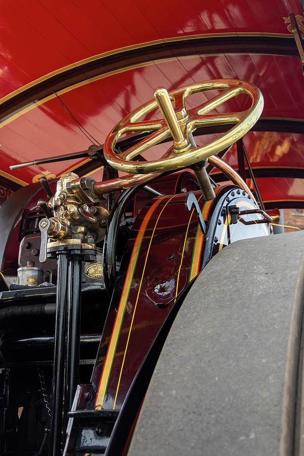 The big brass wheel Photograph by Steev Stamford