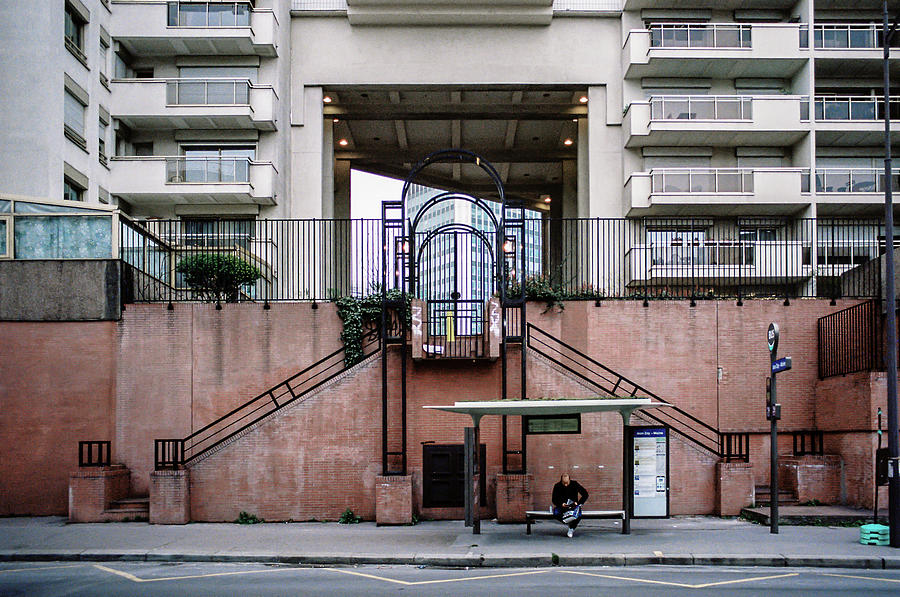 The big city and the small man Photograph by Barthelemy De Mazenod