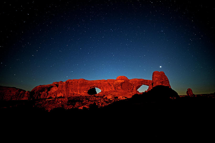 The Big Dipper and Jupiter on North Window and South Window Arches National Park Moab Utah Photograph by Toby McGuire