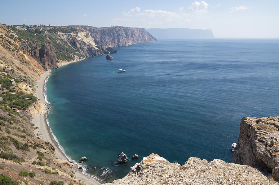 The Black Sea coastline, the sunny summer in Crimea Photograph by Vyacheslav Argenberg