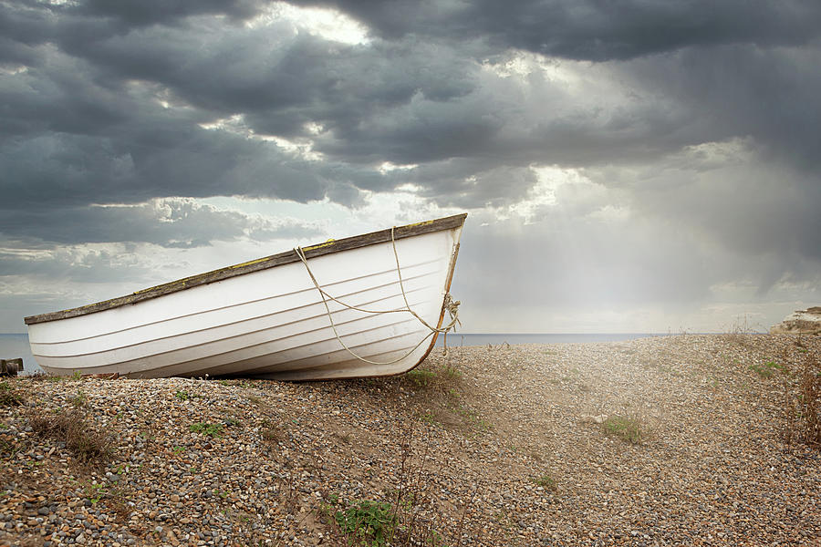 The Boat on Shore Photograph by Karen Varnas