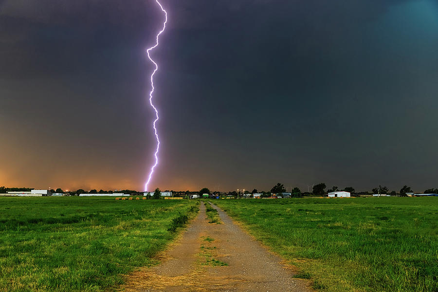 Nature Photograph - The Bolt From Above - Lightning Strike Down Dirt Road in Oklahoma by Southern Plains Photography