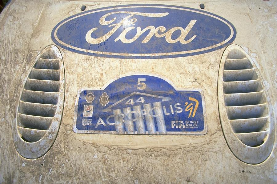 The bonnet of a Ford Escort Photograph by Michael Cooper