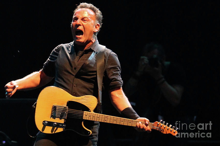 Bruce Springsteen in concert Photograph by Marco Cantile | Fine Art America