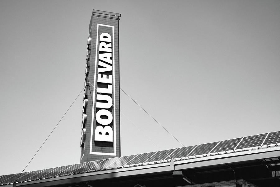 The Boulevard Smokestack At Kauffman Stadium - Black and White Photograph by Gregory Ballos