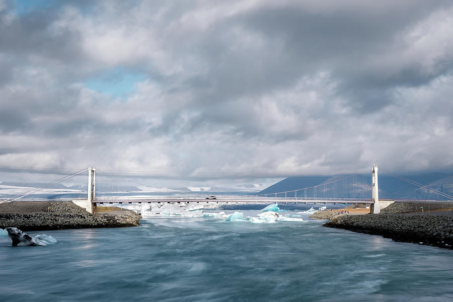 The Bridge at Jokulsarlon Glacial Lagoon in Iceland Photograph by Alexios Ntounas