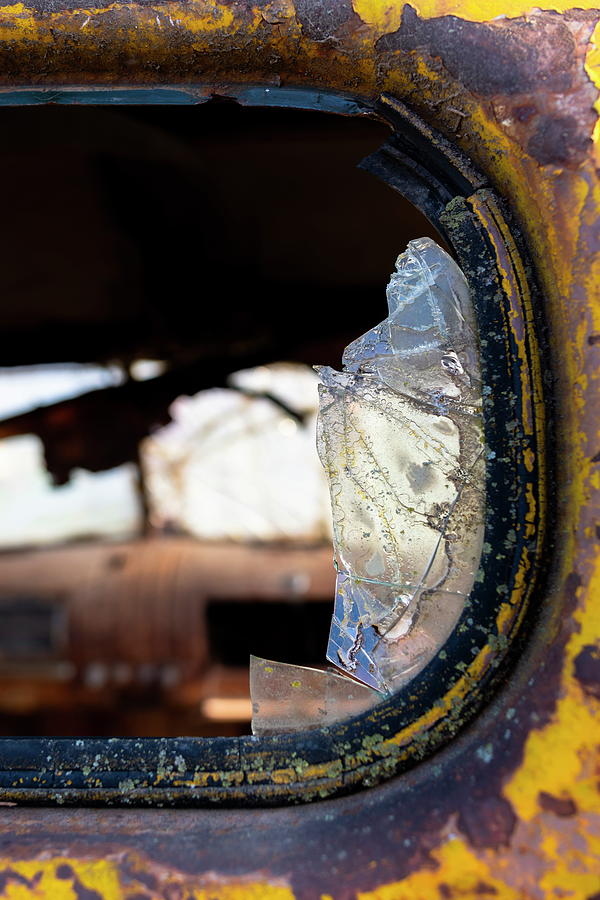 The broken rear window on a 1946 Chevy truck Photograph by Art Whitton