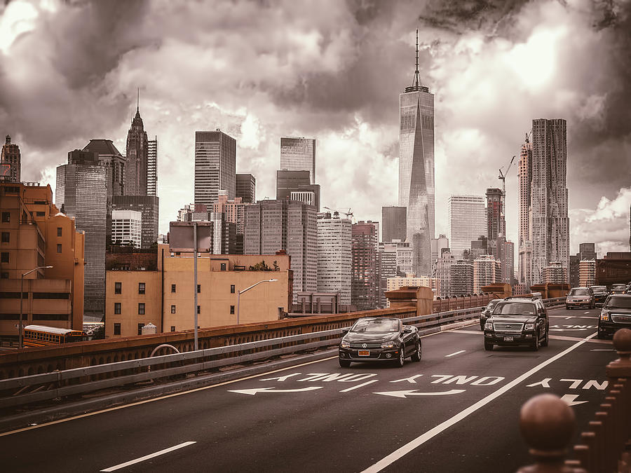 The Brooklyn Bridge and the city skyline in New York Photograph by Karel Miragaya