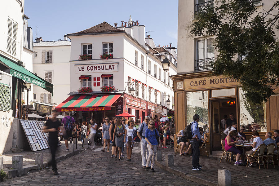 The bustling streets of Montmartre in Paris. Photograph by Julian Elliott Photography