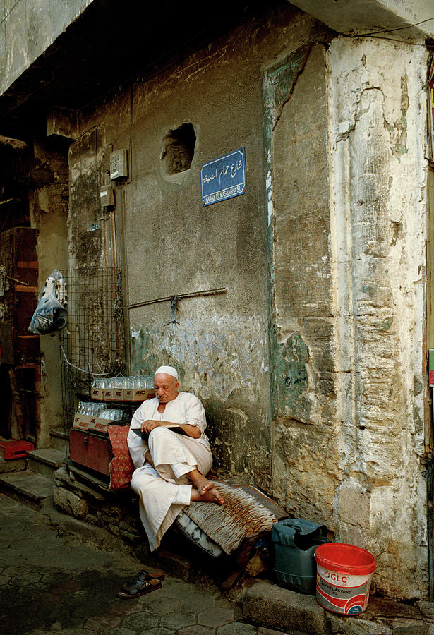 The Cairo Reader Photograph by Shaun Higson