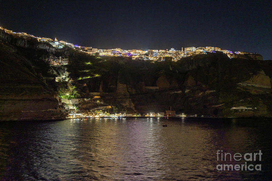 the city of Fira, Santorini, Greece at night l6 Photograph by Ohad Shahar