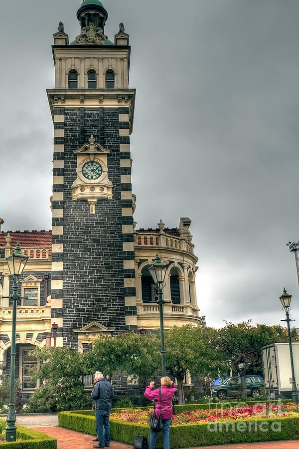 The Clock Tower at Dunedin Railway Station, New Zealand Photograph by Elaine Teague
