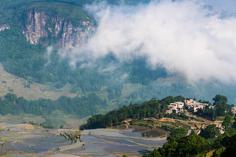 The cloud sea and the terraced fields and village Photograph by Zhouyousifang
