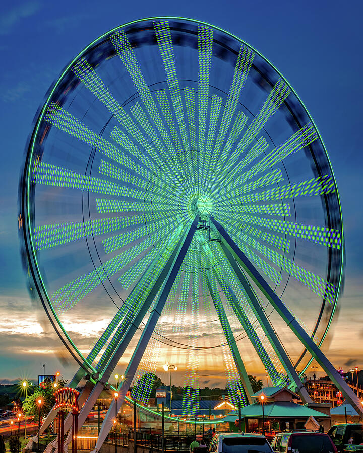 The Colorful Branson 76 Strip Ferris Wheel at Dusk Photograph by Gregory Ballos