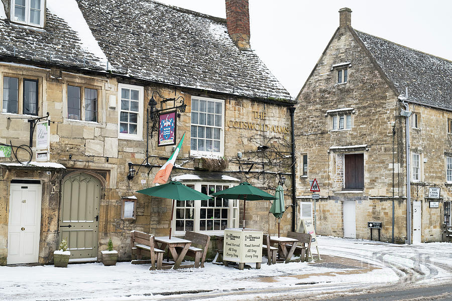 The Cotswolds Arms Burford in the Snow Photograph by Tim Gainey