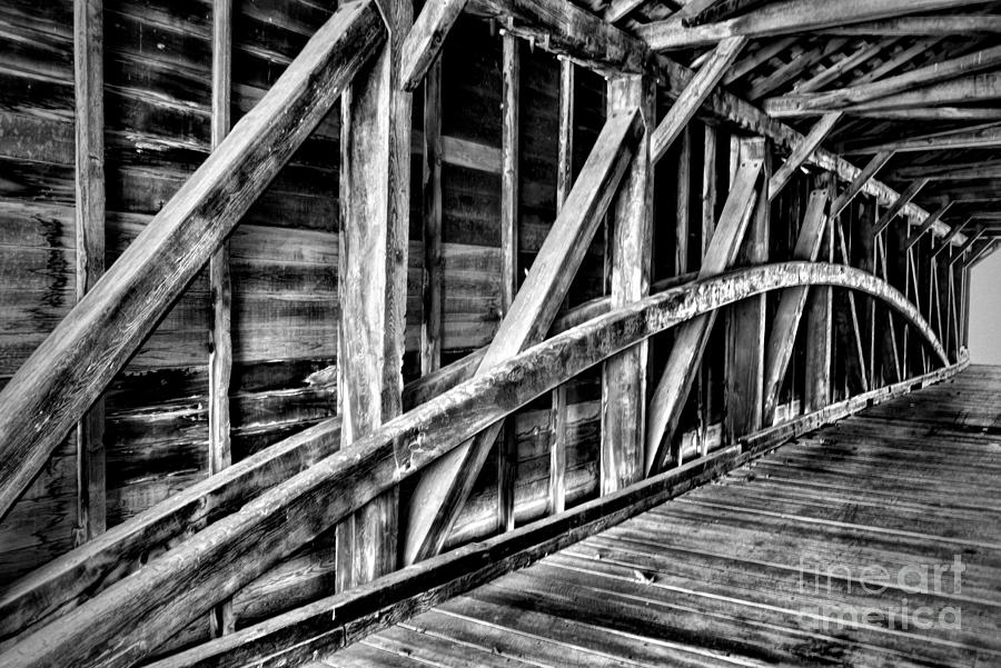 The Covered Bridge Wooden Structure black and white Photograph by Paul Ward