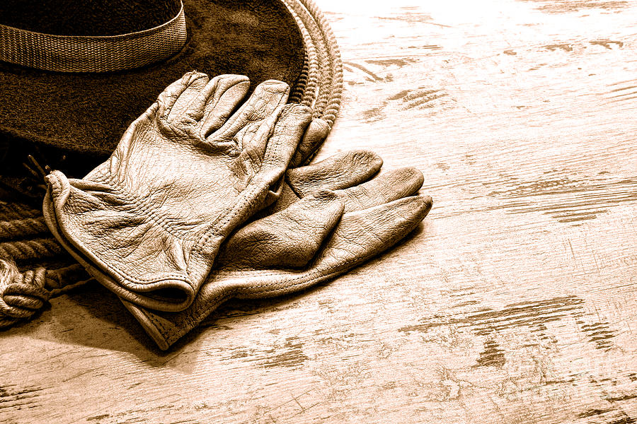 The Cowboy Gloves - Sepia Photograph by Olivier Le Queinec