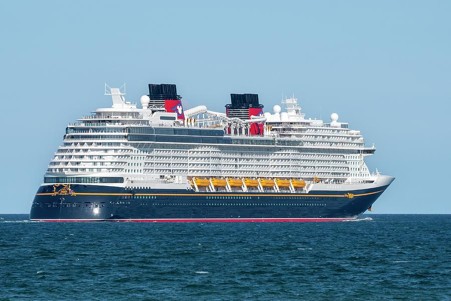 The Disney Wish Cruising in Blue Ocean Photograph by Bradford Martin
