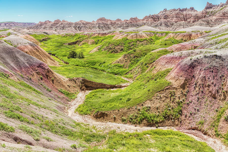 The Drama of the Badlands Photograph by John M Bailey
