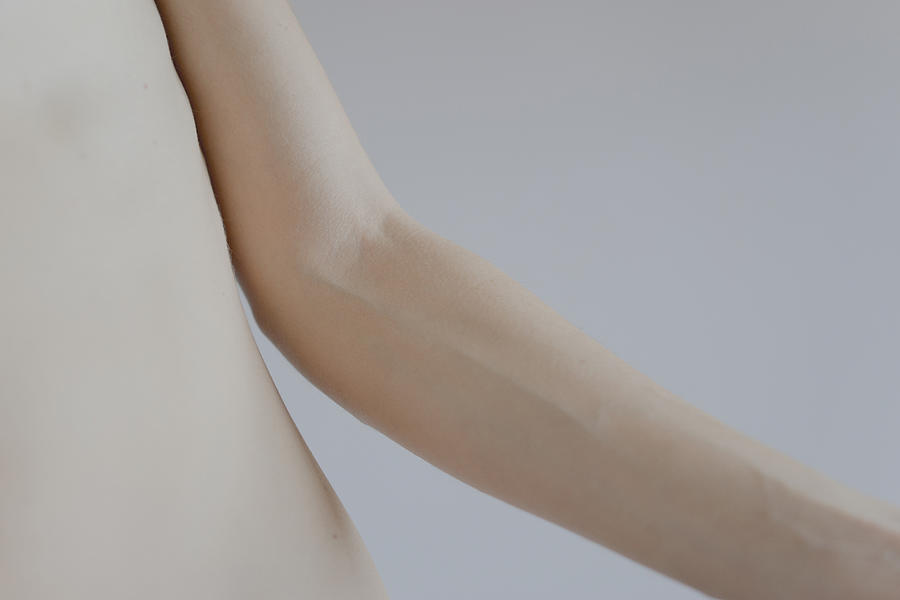 The Elbow of a Female Model Photograph by Michael Robbins
