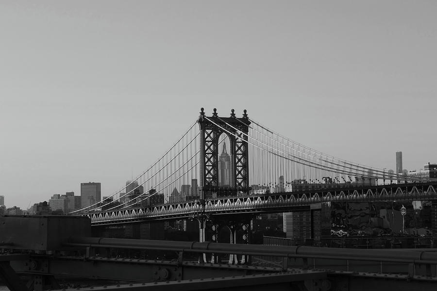 The Empire State Building through the Manhattan Bridge Black and White Photograph by Toby McGuire