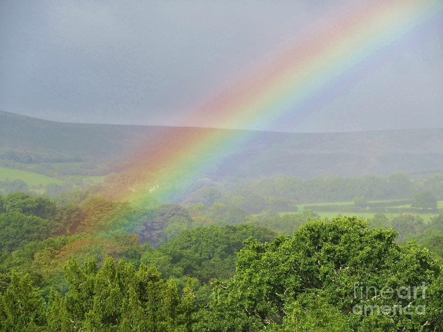 Rainbow Photograph - The End Of The Rainbow by Lesley Evered