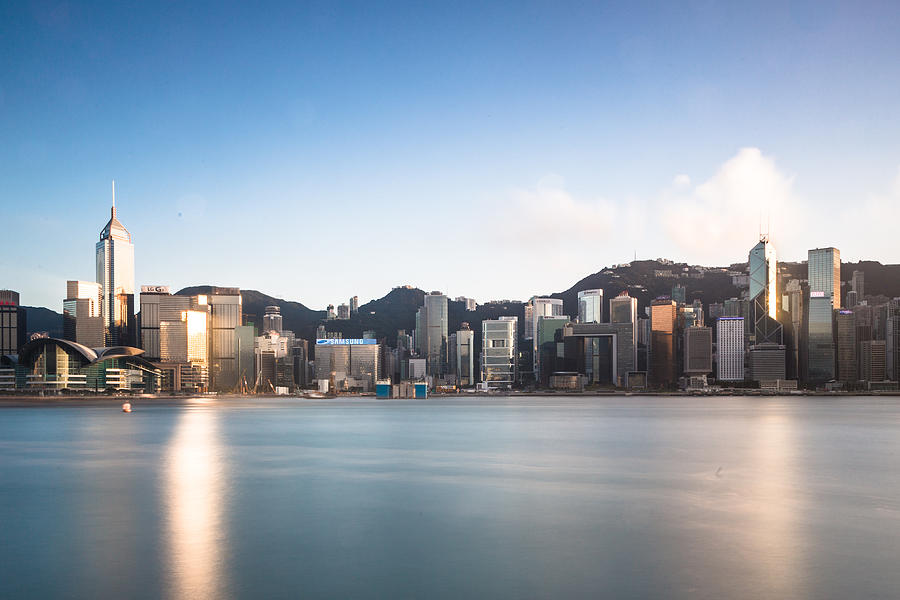 The famous Hong Kong island skyline captured with a long exposure Photograph by @ Didier Marti