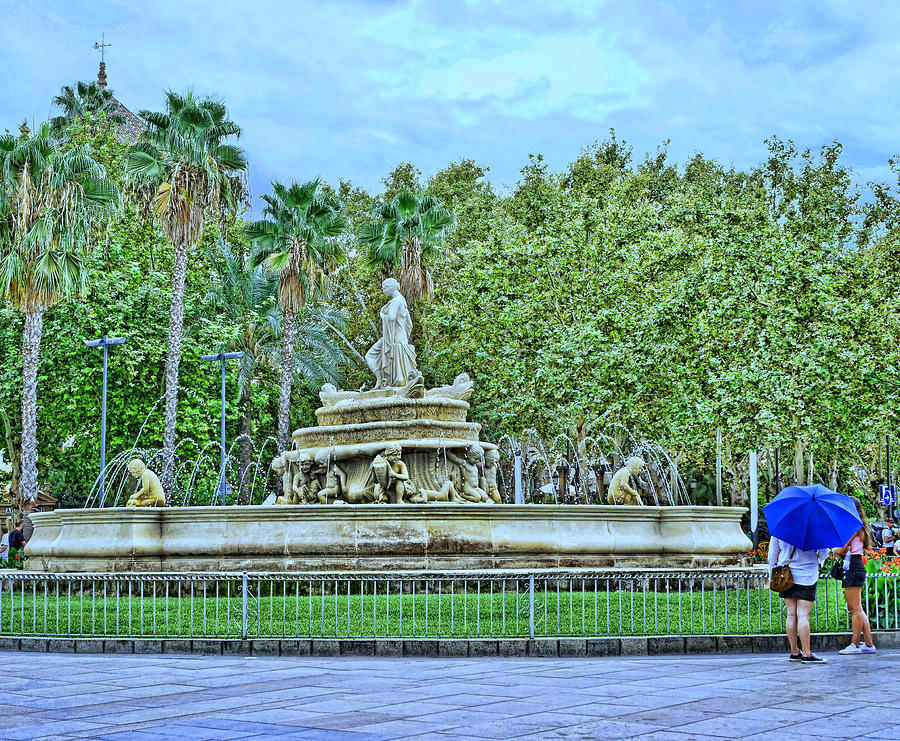 The Fountain And Blue Umbrella - Seville Photograph