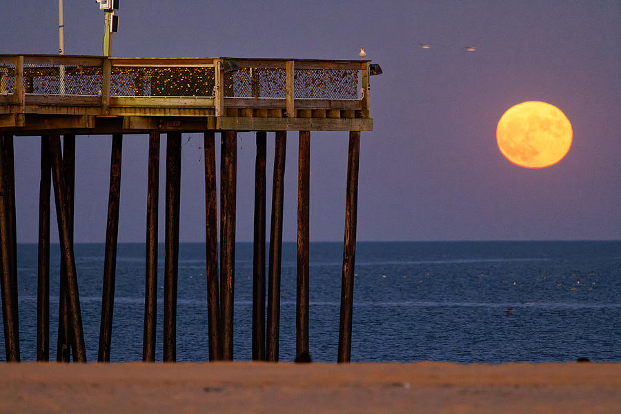 The  Full Moon at the Ocean City Pier Photograph by Ken Fullerton