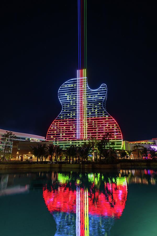 The Guitar Hotel - Seminole Colors Photograph by Claudia Domenig - Fine ...