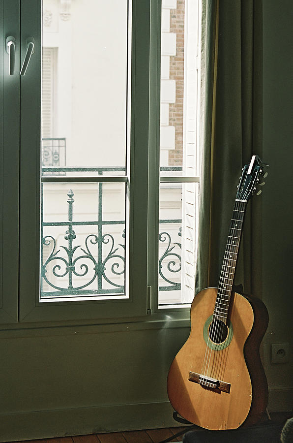 The guitar, the window and the sun Photograph by Barthelemy de Mazenod