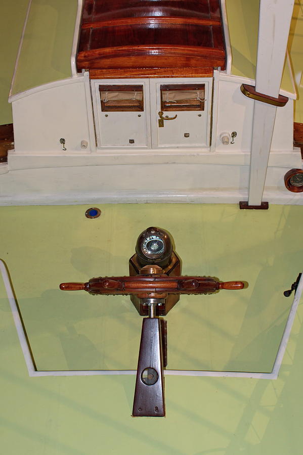 The helm of a vintage motor boat seen from above Photograph by Ulrich Kunst And Bettina Scheidulin