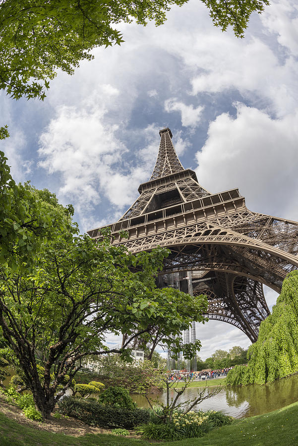 The iconic Parisian landmark Eiffel Tower and Champ de Mars on the Left Bank of Seine River in spring Photograph by Silkfactory