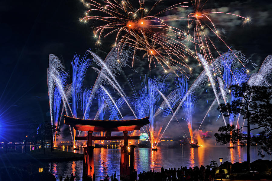 The IllumiNations Reflections Of Earth Laser and Fireworks Photograph ...