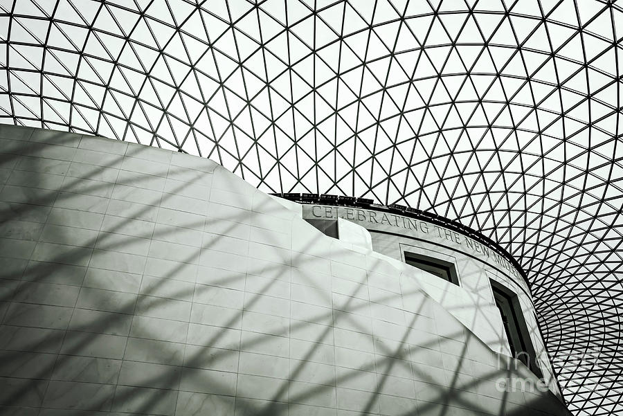 The interior of the British Museum in London, depicting a section of the Great Court with staircase and geometric roof Photograph by Jane Rix