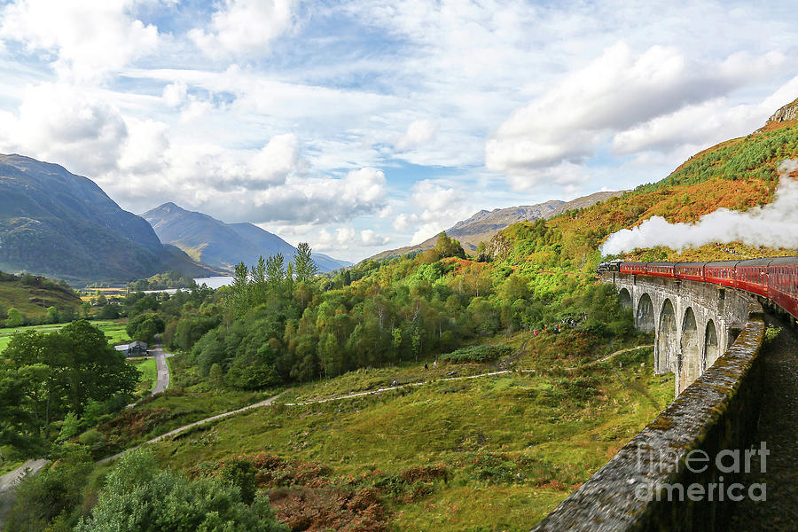 The Jacobite Express crossing the Glenfinnan Viaduct Scotland Photograph by John Keates