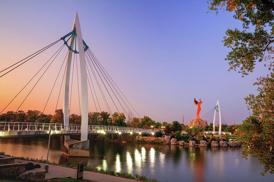 The Keeper Of The Plains And Suspension Bridges At Dusk - Wichita Kansas Photograph by Gregory Ballos