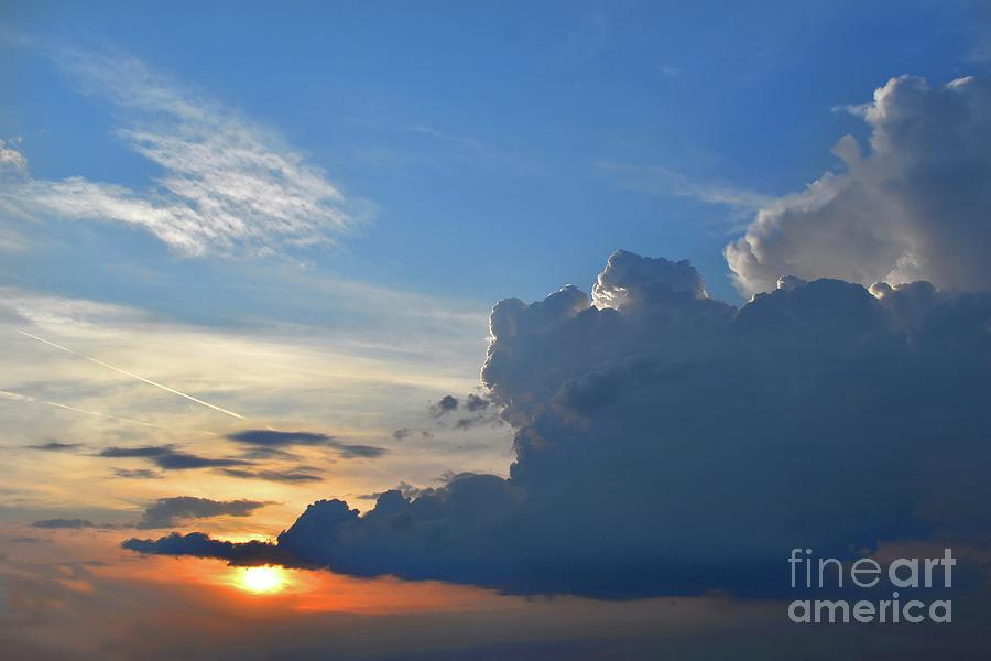 The Kiss of Sunset and Clouds Photograph by Leonida Arte