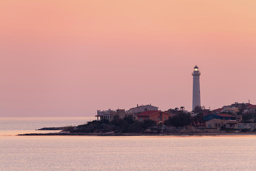 The lighthouse in Punta Secca at sunset Photograph by Mirko Chessari