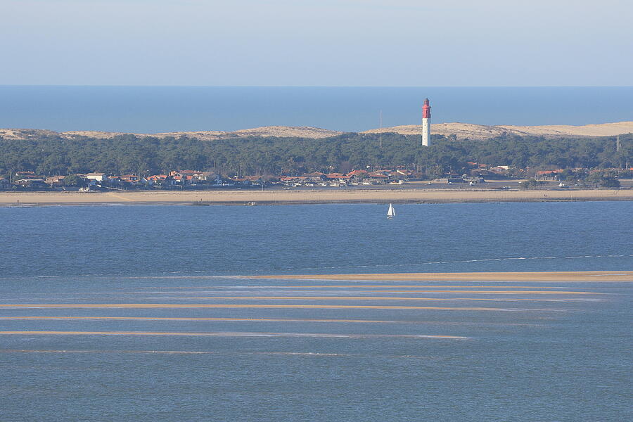Lighthouse Photograph - The Lighthouse Of Cap Ferret On The French Bassin Darcachon by Eric BRENAC