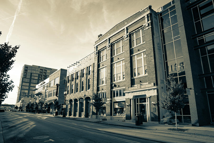The Little Rock River Market District Awakens - Sepia Edition Photograph by Gregory Ballos