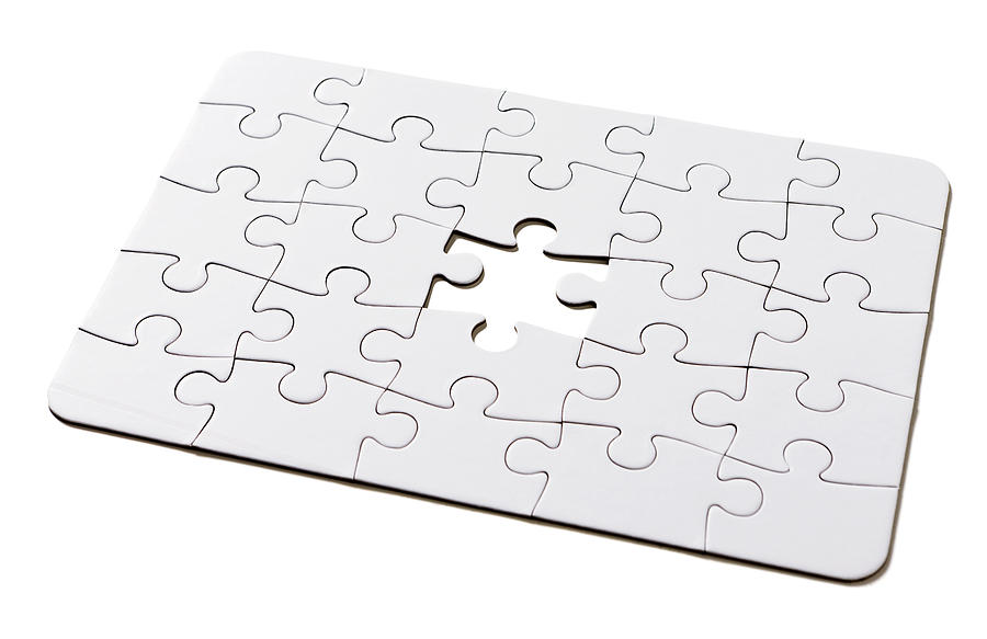 The missing link: incomplete all-white jigsaw puzzle on white Photograph by RapidEye