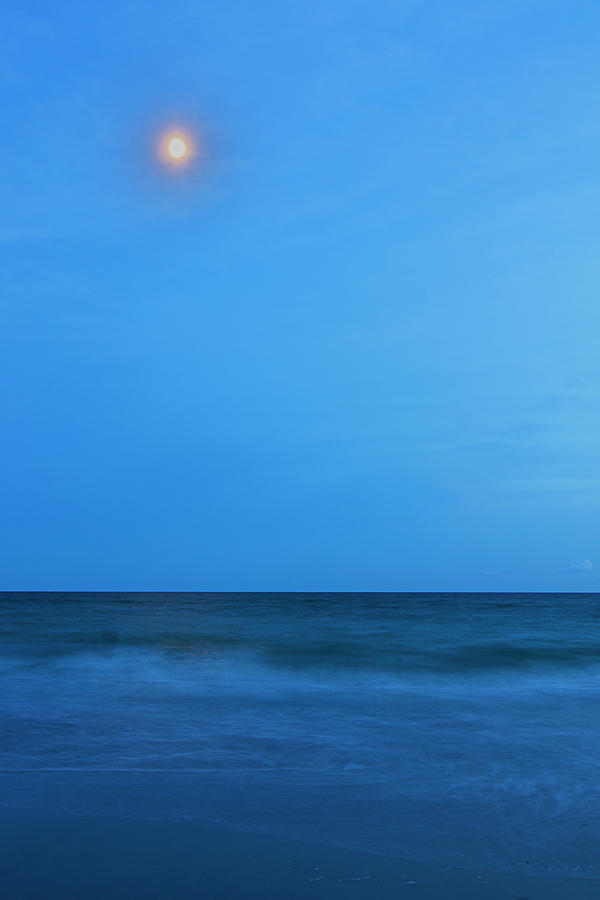 The Moon Over the Ocean Photograph by Bob Decker