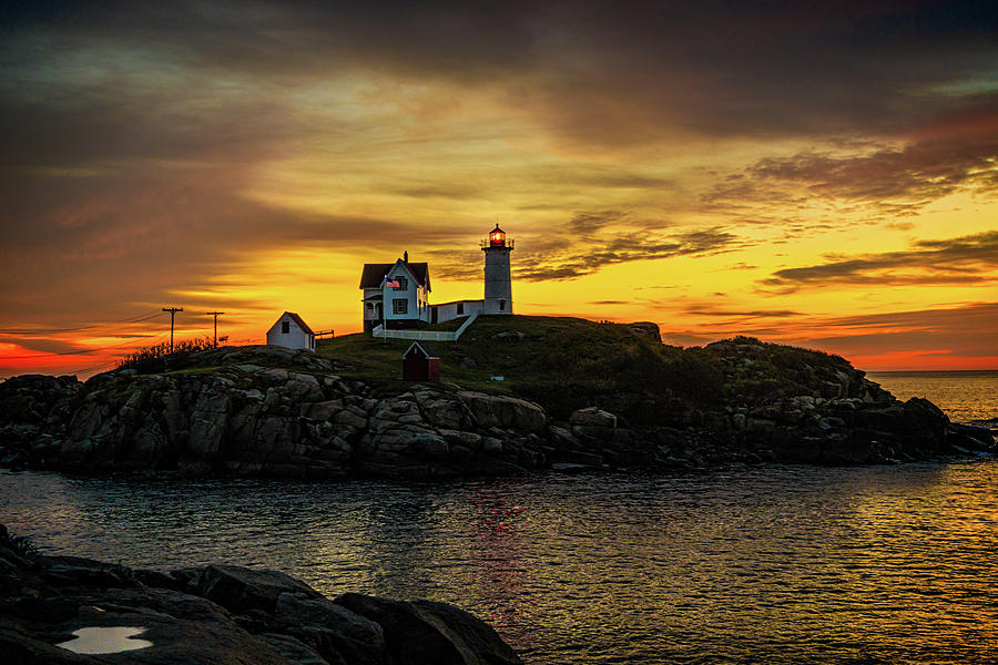 The Nubble Lighthouse At Sunrise Photograph