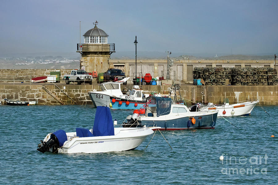 The Old Lighthouse Smeatons Pier St Ives Photograph by Terri Waters